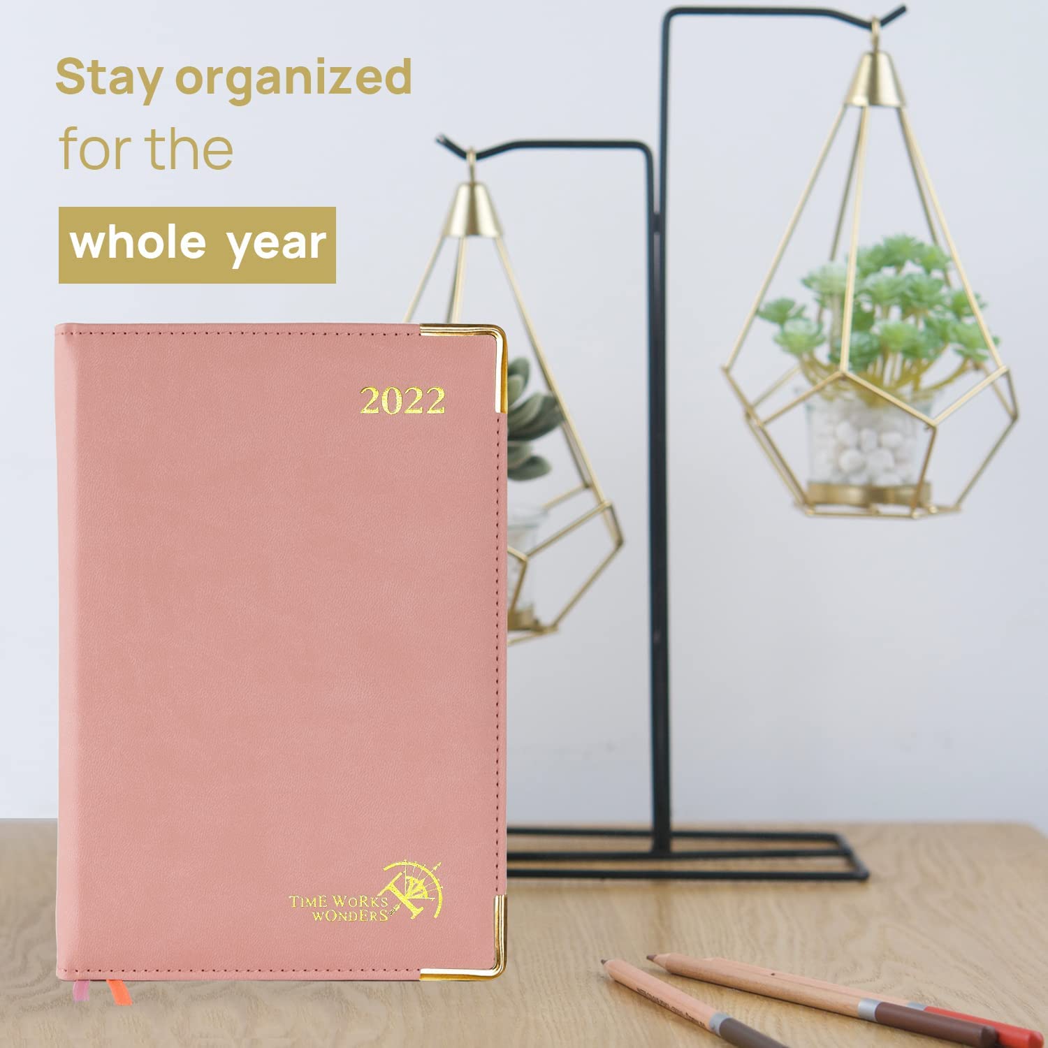 agenda de color rosa para planificar clases de ingles